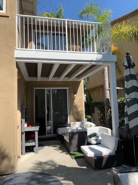 Completed balcony rebuild in Talega, San Clemente by Tuscany Builders — Trex decking and iron railing